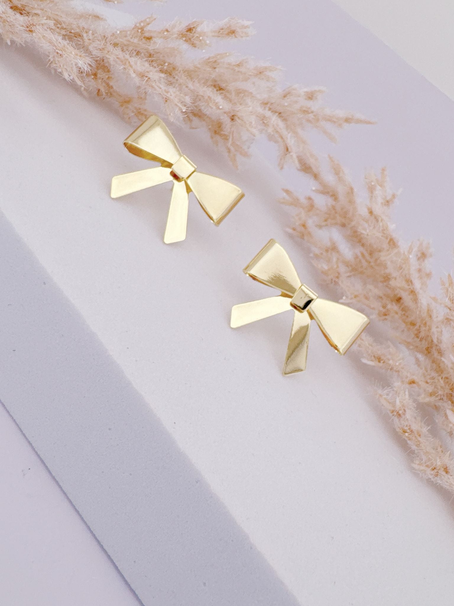0057- BOW EARRING